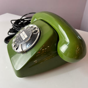 Telefon grün mit Wählscheibe und Kabel