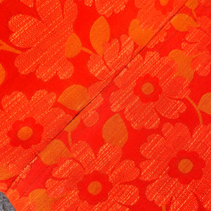 Sessel mit Tulpenfuß orange creme 70er