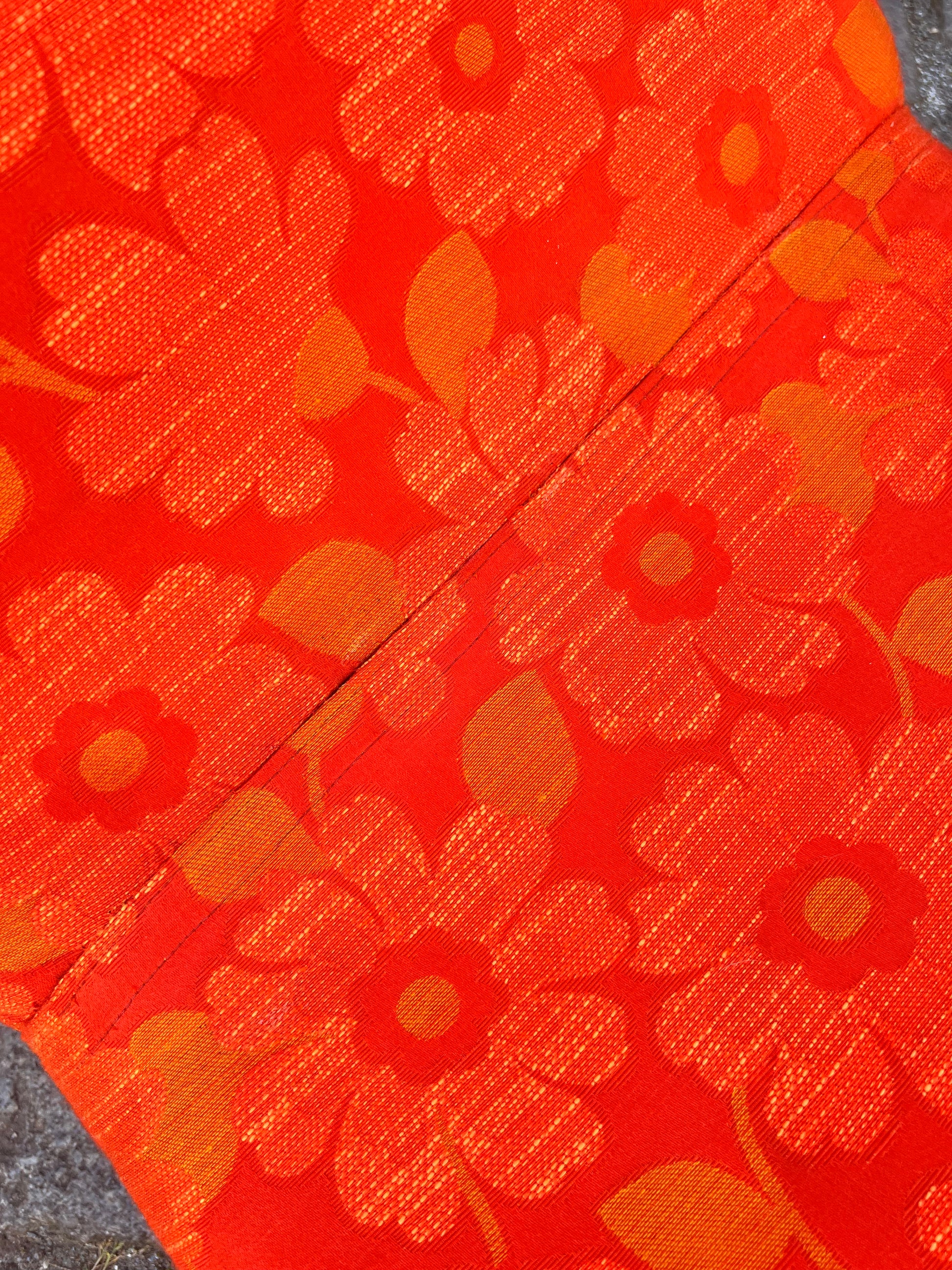 Sessel mit Tulpenfuß orange creme 70er