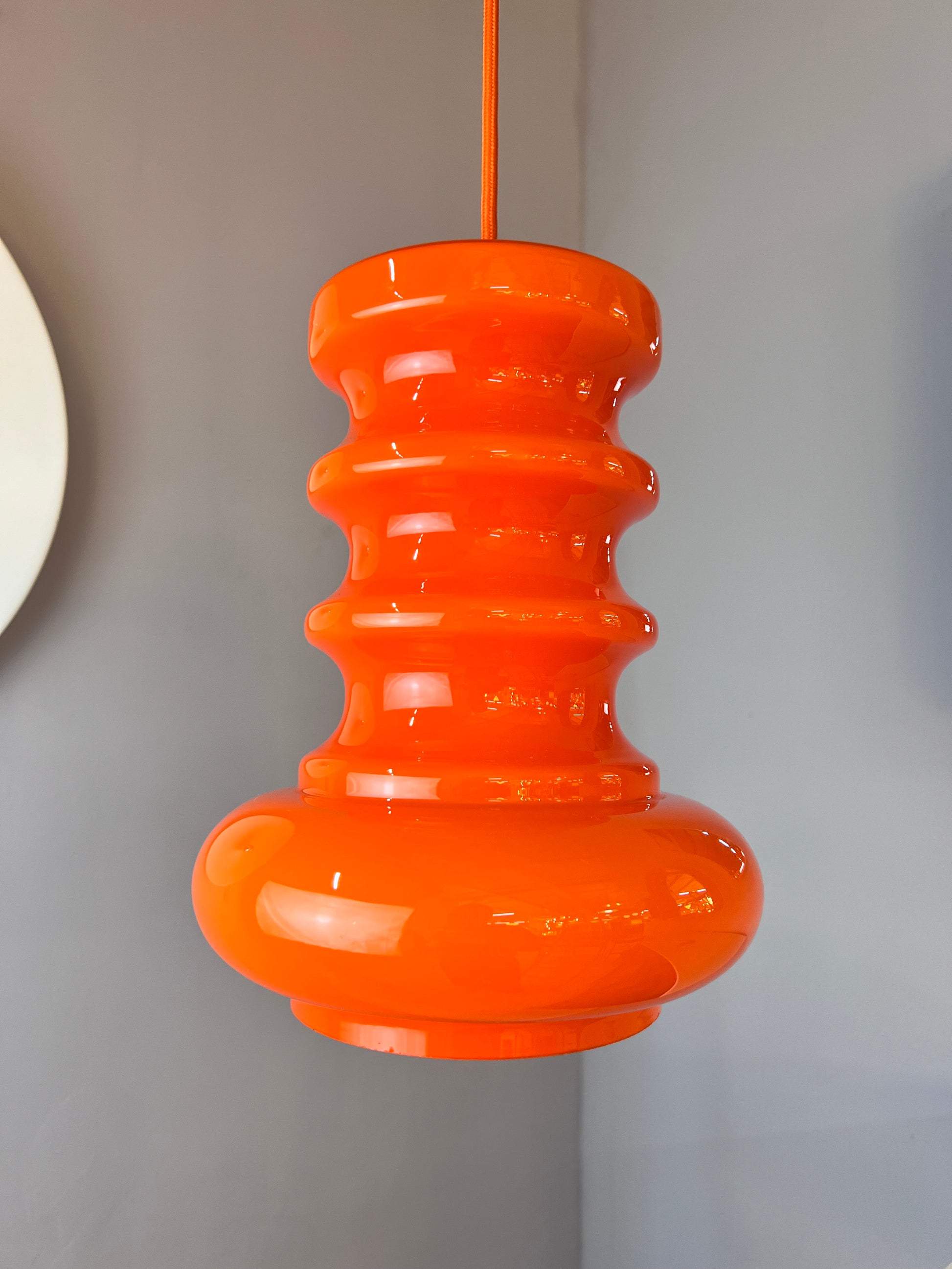 Hängelampe orange Glas