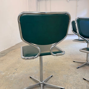 Drehbarer Polsterstuhl grün Kunstleder Chrom