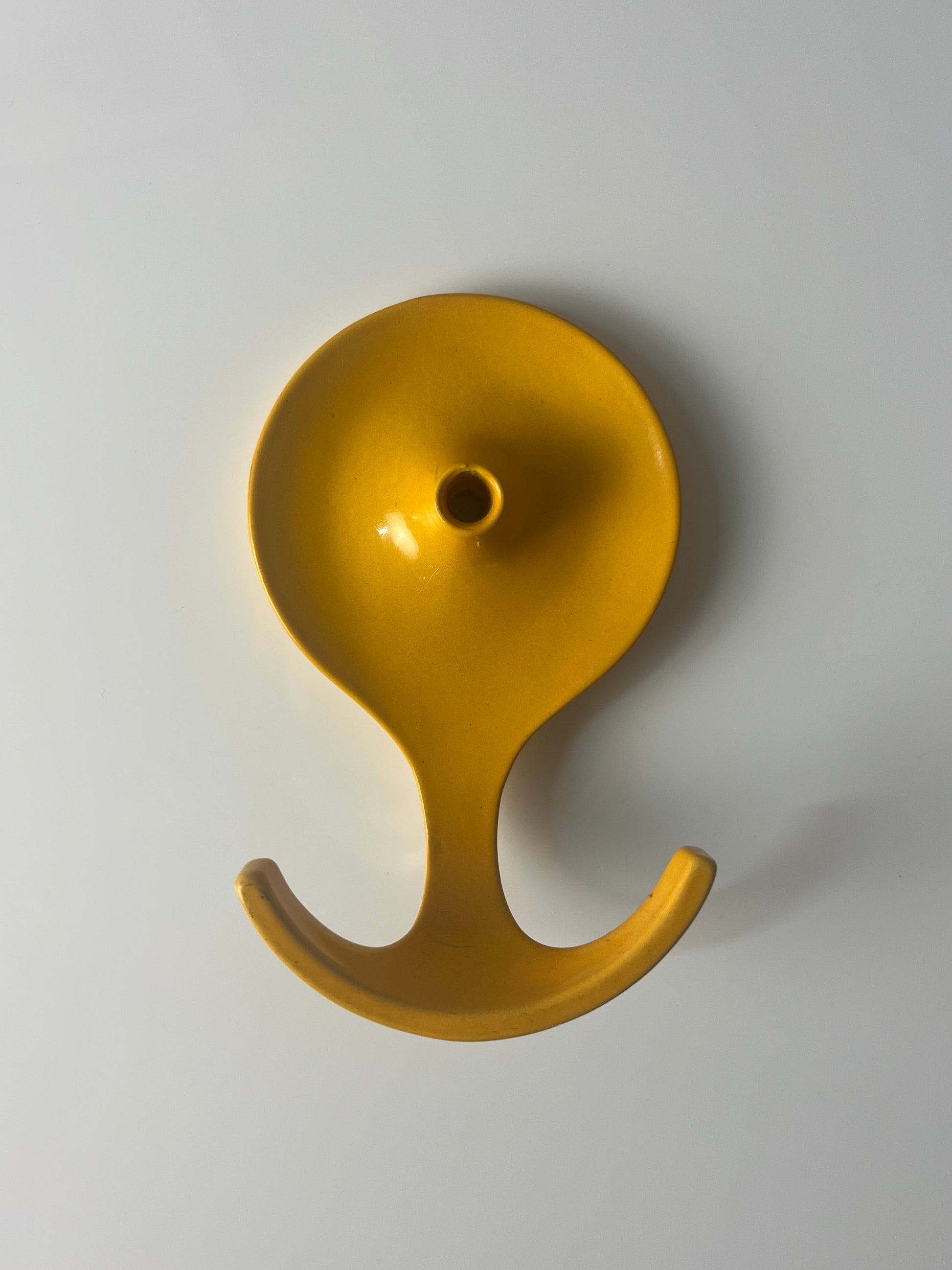 Wandhaken gelb Metall