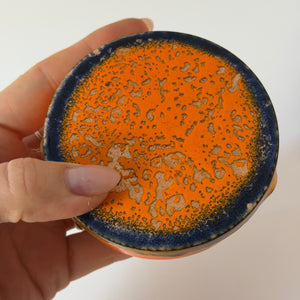 Set: 8x Untersetzer orange emailliertes Kupfer von VEB Zwintschöna