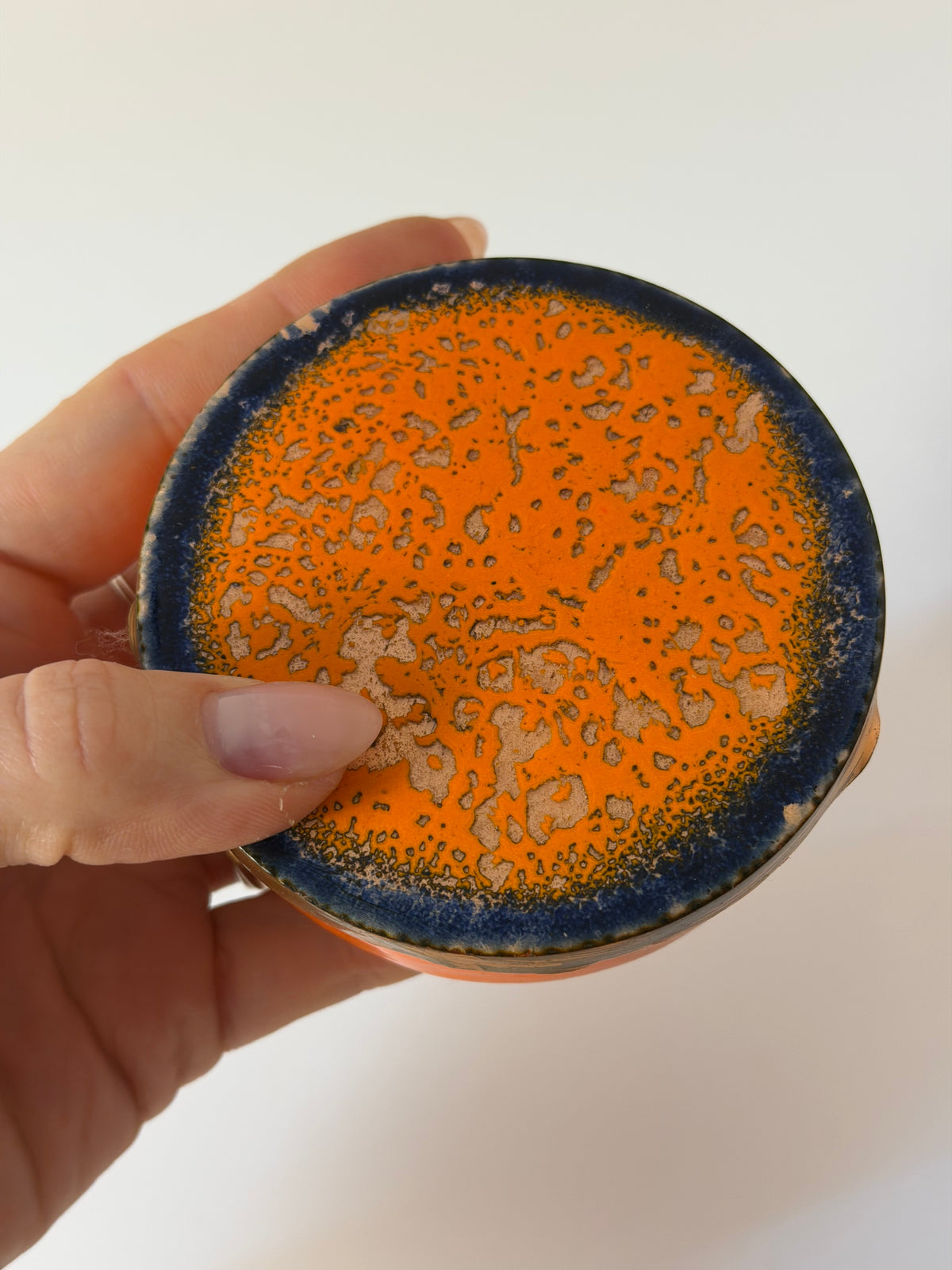 Set: 8x Untersetzer orange emailliertes Kupfer von VEB Zwintschöna