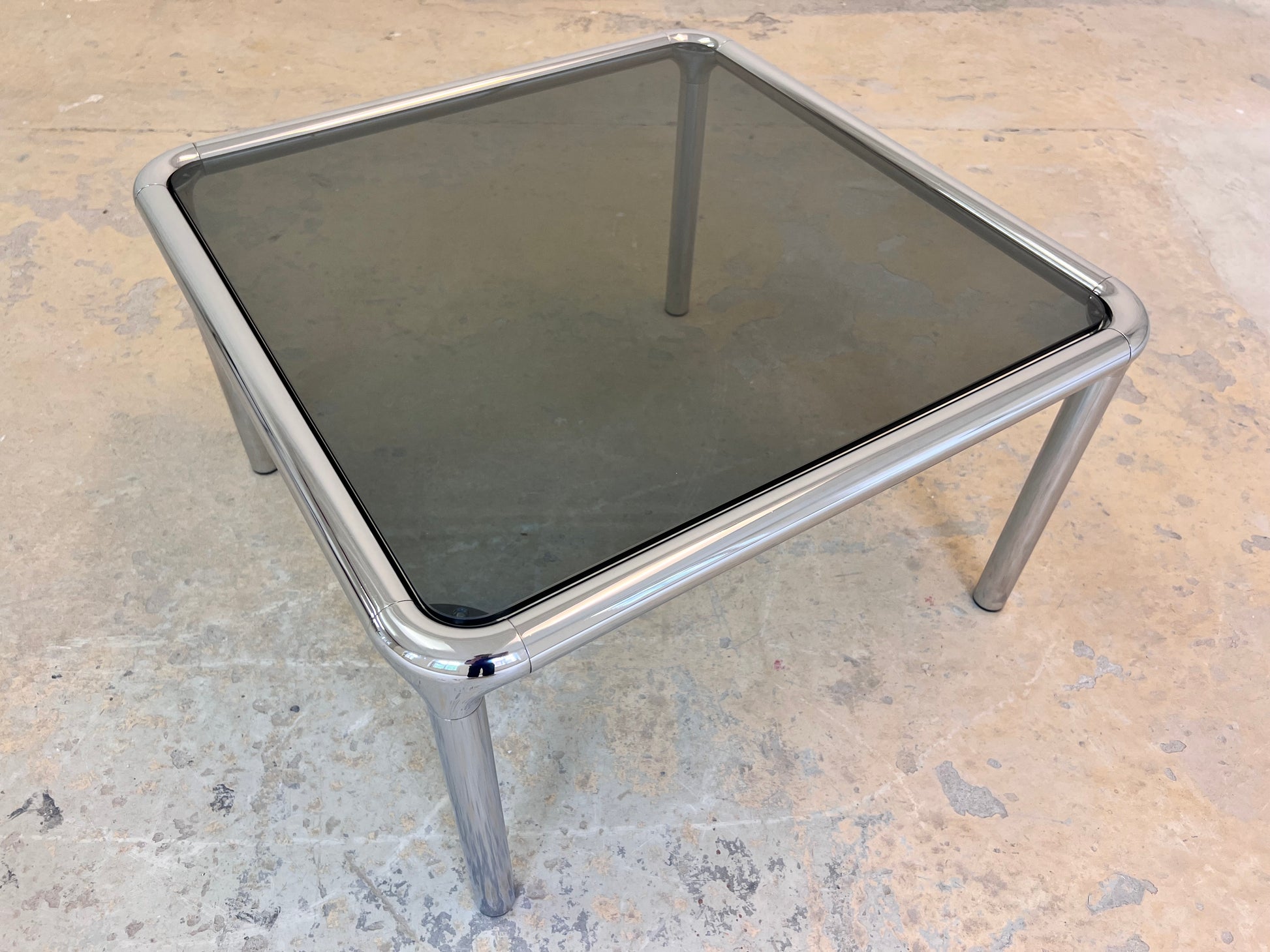 Couchtisch Chrom Rauchglas ETIENNE FERMIGIER