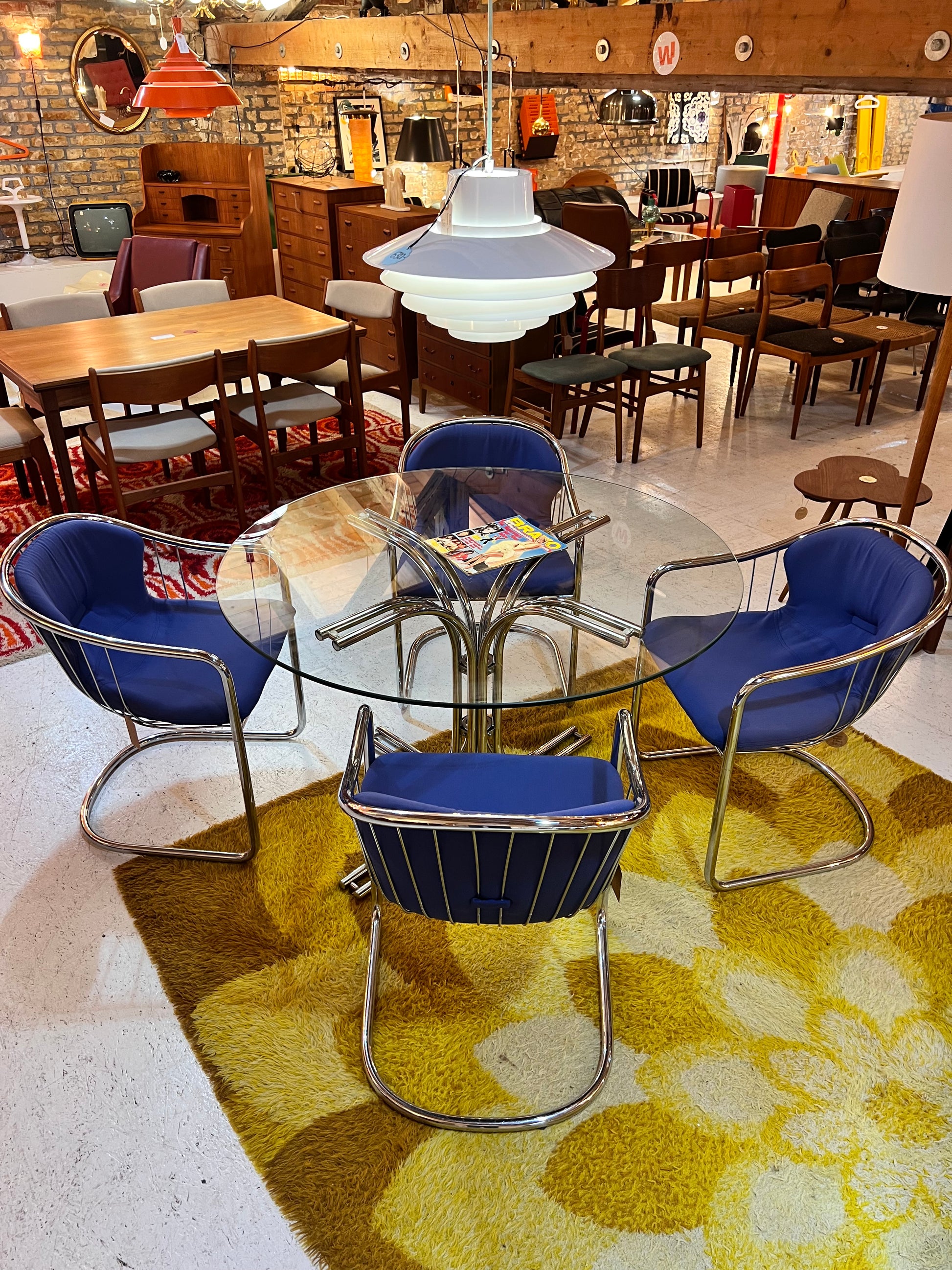 Set: 4x Freischwinger Chrom blau und runder Glastisch von Gastone Rinaldi für Alma