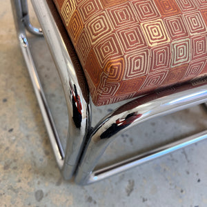 Hocker Chrom mit orange braunem Polster
