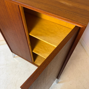 Schrank Teak mit Schloss & neuen Chromfüßen von Heinrich Riestenpatt