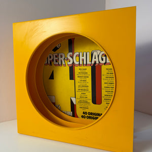 Schallplattenständer gelb von Schweizer Design