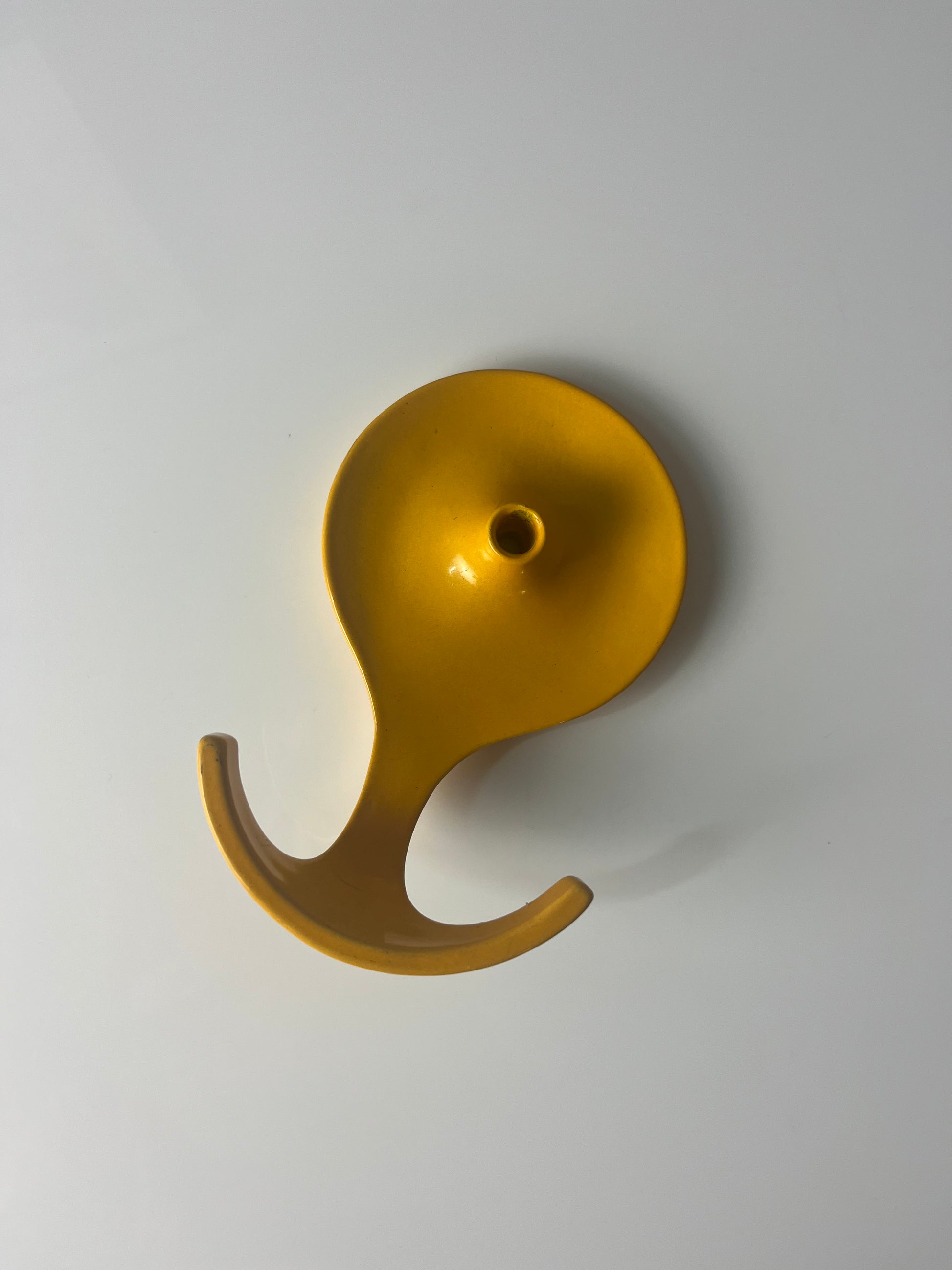 Wandhaken gelb Metall