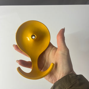 Wandhaken gelb Metall