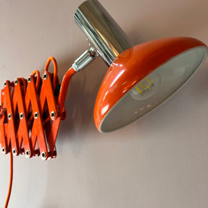 Wandlampe orange von Hustadt Scherenlampe