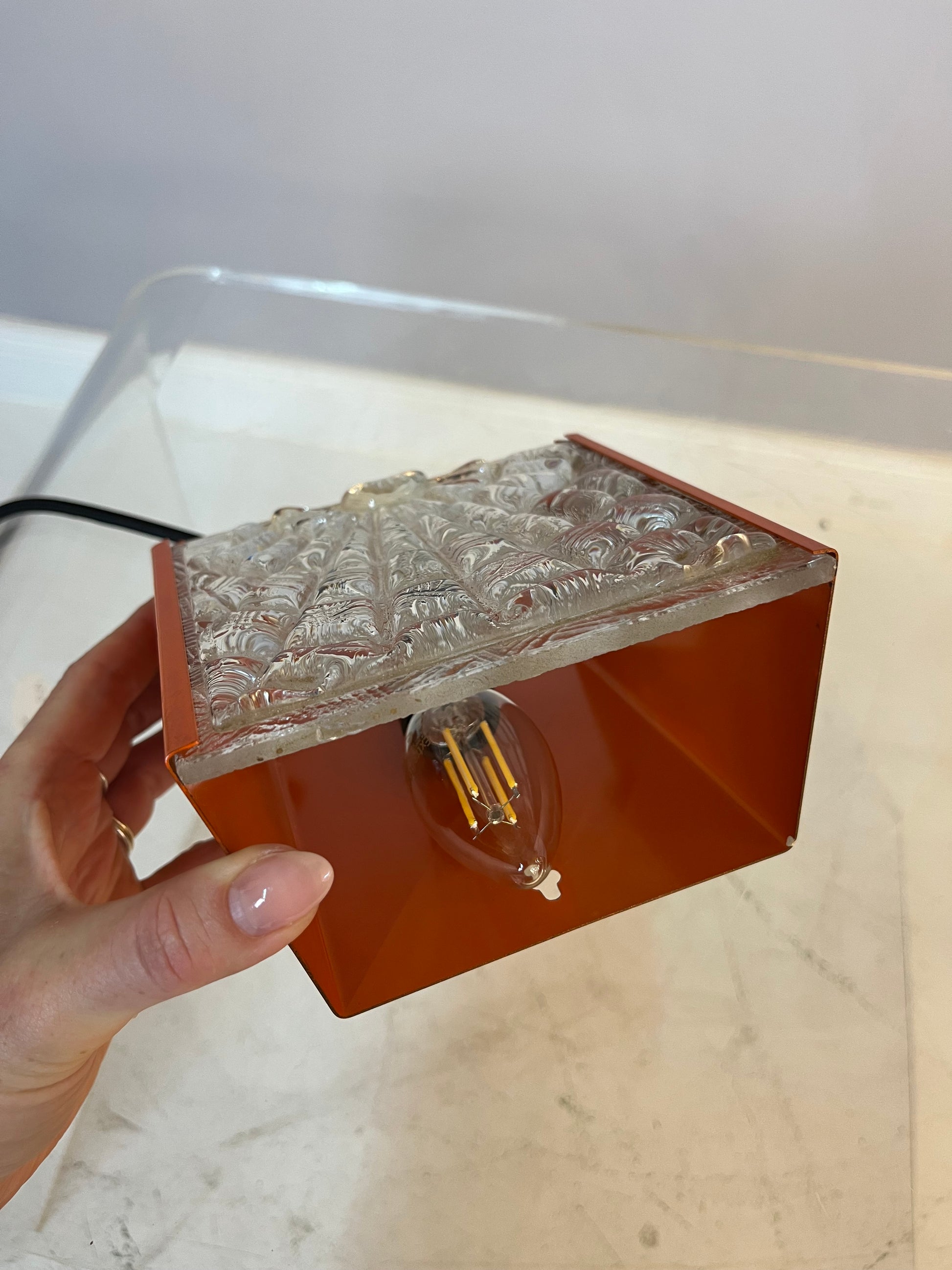 Wandlampe orange Glas