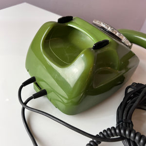 Telefon grün mit Wählscheibe und Kabel