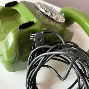 Telefon grün mit Wählscheibe und Kabel