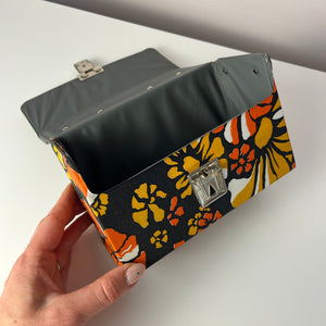 Aufbewahrungsbox für Kassetten orange braun gelb