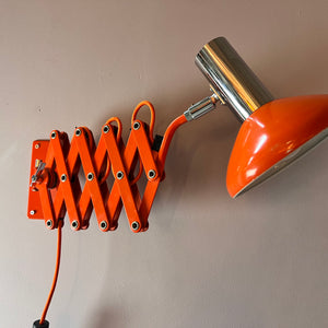 Wandlampe orange von Hustadt Scherenlampe