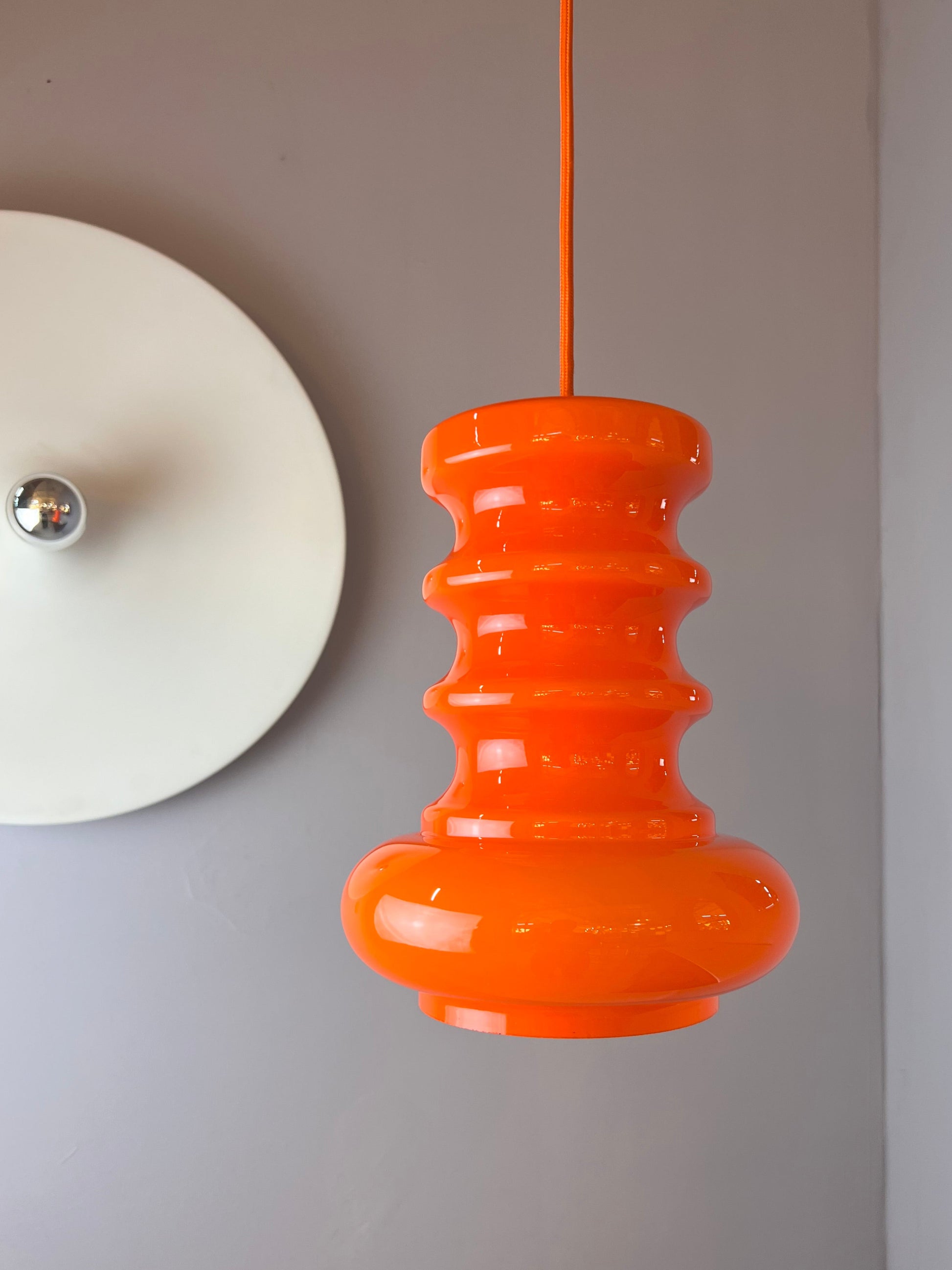 Hängelampe orange Glas