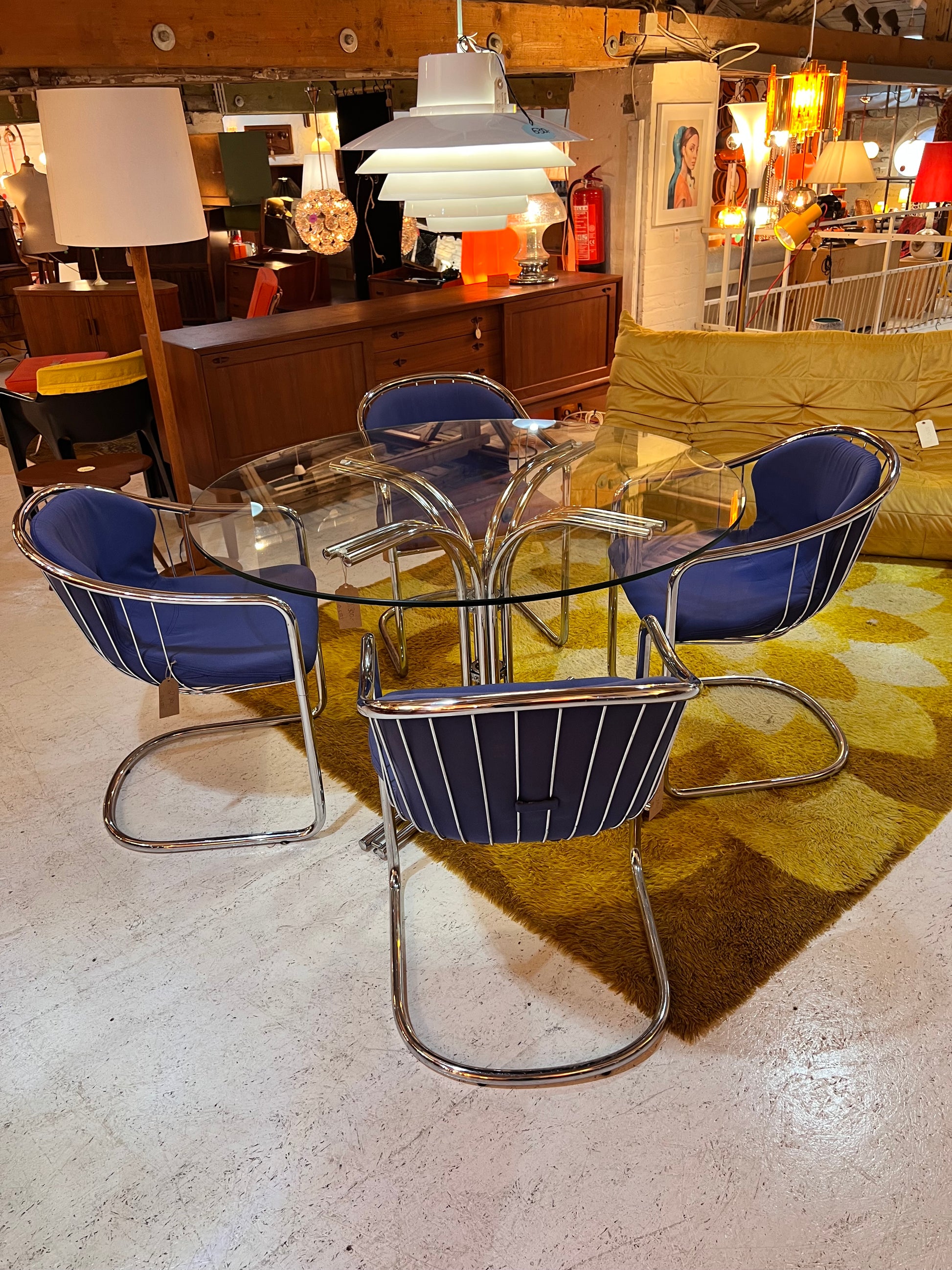 Set: 4x Freischwinger Chrom blau und runder Glastisch von Gastone Rinaldi für Alma