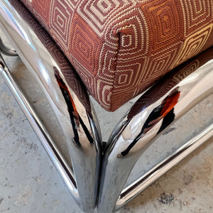 Hocker Chrom mit orange braunem Polster