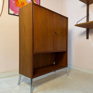 Schrank Teak mit Regalfach, Schloss & neuen Chromfüßen von Heinrich Riestenpatt