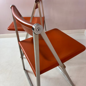 Klappstuhl orange silber von Interlübke