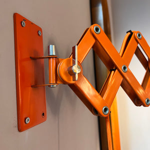 Wandlampe orange von Hustadt Scherenlampe