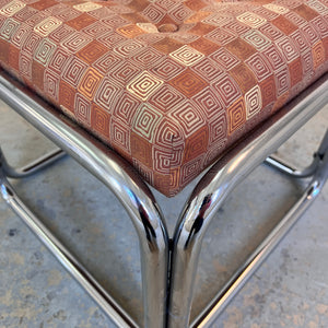 Hocker Chrom mit orange braunem Polster