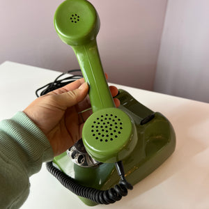 Telefon grün mit Wählscheibe und Kabel