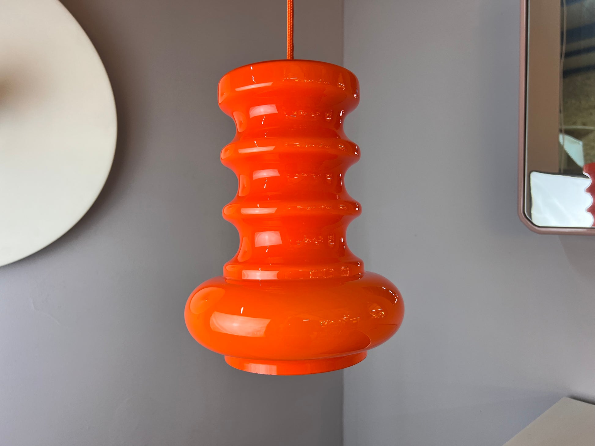 Hängelampe orange Glas