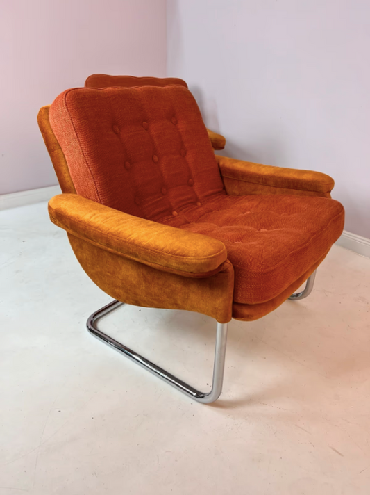 Freischwinger Sessel orange Chrom